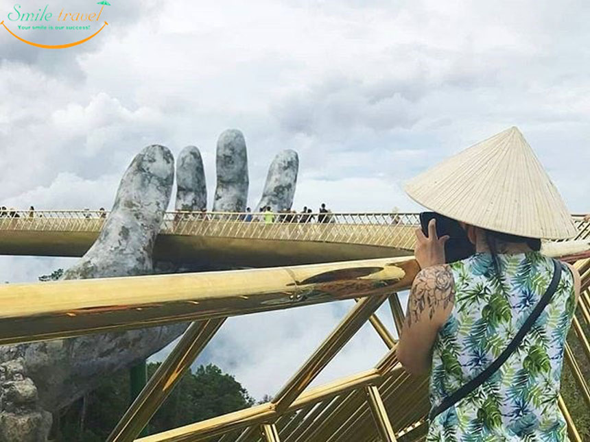 Vietnam golden bridge,golden bridge,golden bridge vietnam location,how to get to golden bridge vietnam,golden bridge da nang price,golden bridge vietnam price,golden bridge da nang location,golden bridge da nang entrance fee,hoi an to golden bridge,golden bridge vietnam how to get there, Cau Vang, Cau Vang Danang, Smile Travel